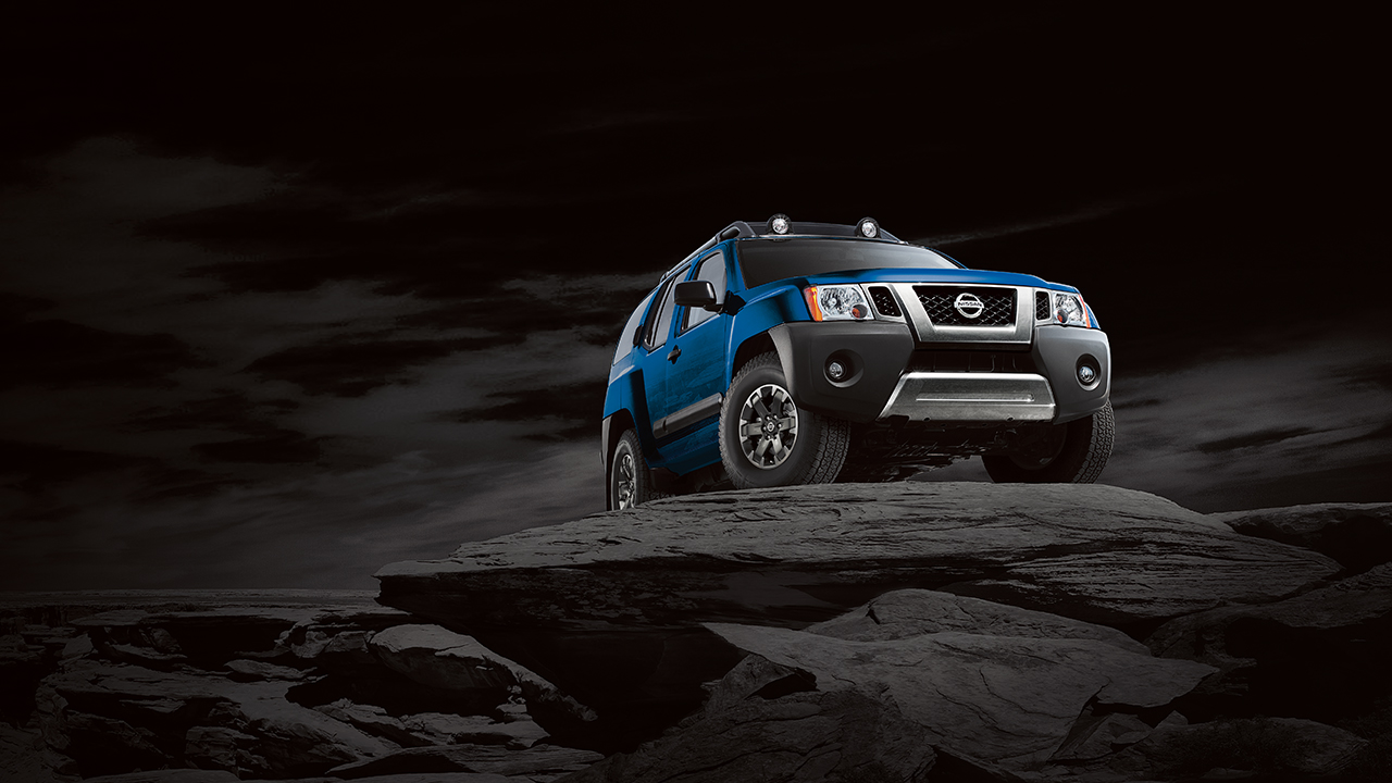 Nissan Xterra, front profile, in blue