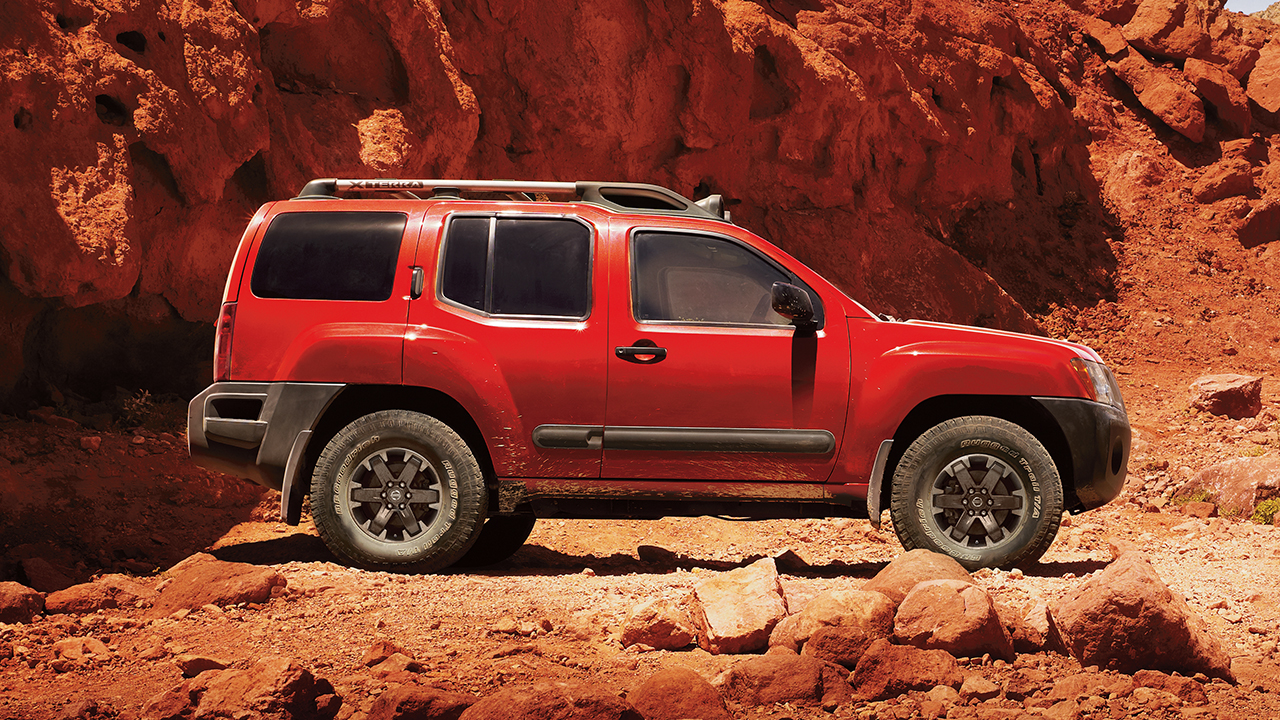 Nissan Xterra, side profile, in red