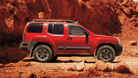 Nissan Xterra, side profile, in red